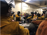 Terry Stead and Robert Claud volunteering to speak with welding students from NTC.